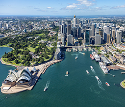 Aerial shot of Sydney harbour with ships entering and exiting