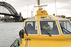 Pilot vessel in front of OPT with Harbour bridge in the background