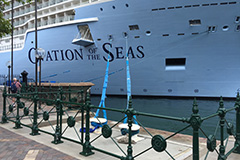 Ovation of the Seas attached to bollards at OPT