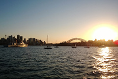 Vessel out on Sydney Harbour at sunset